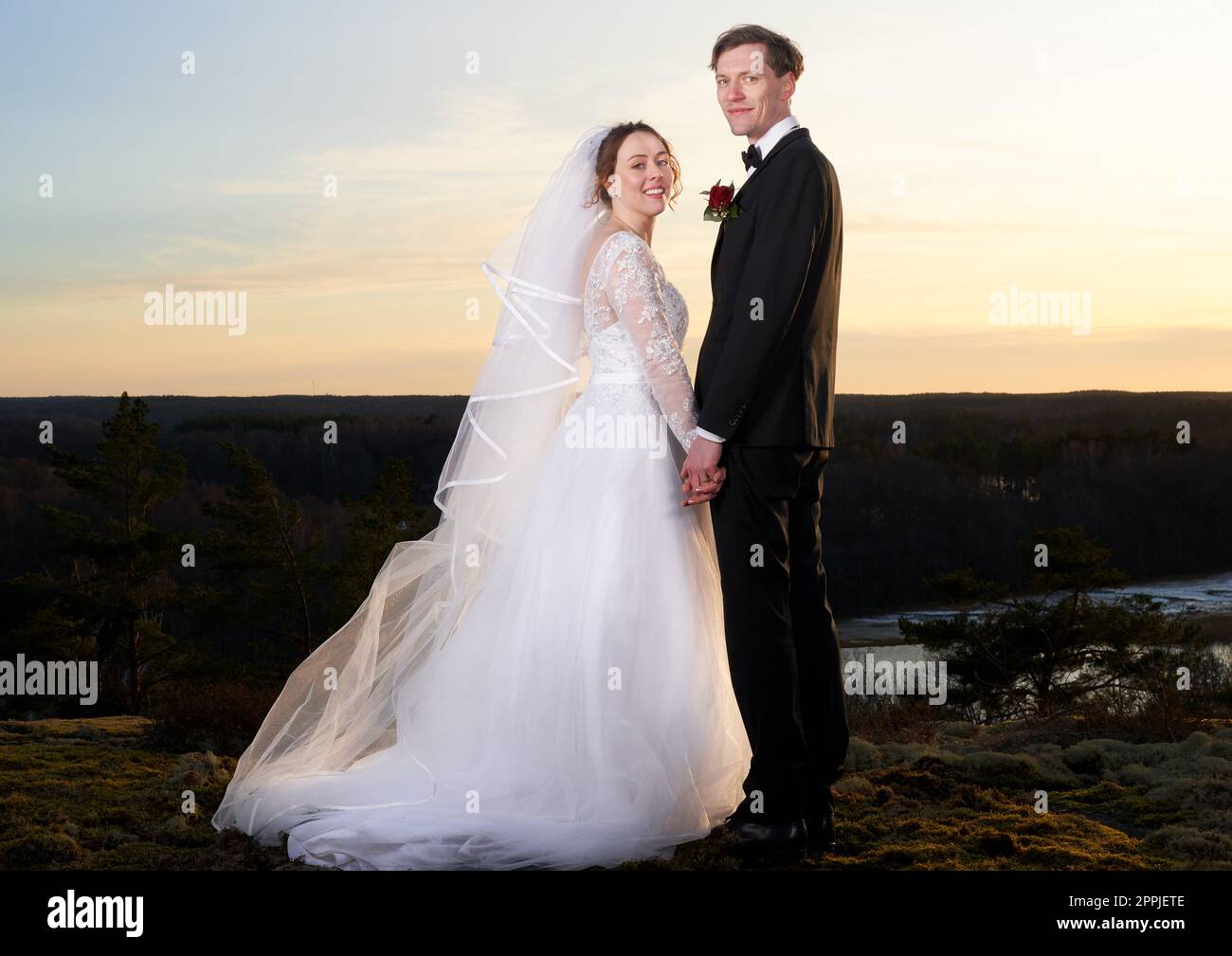 Young and happy newly weds Stock Photo Alamy