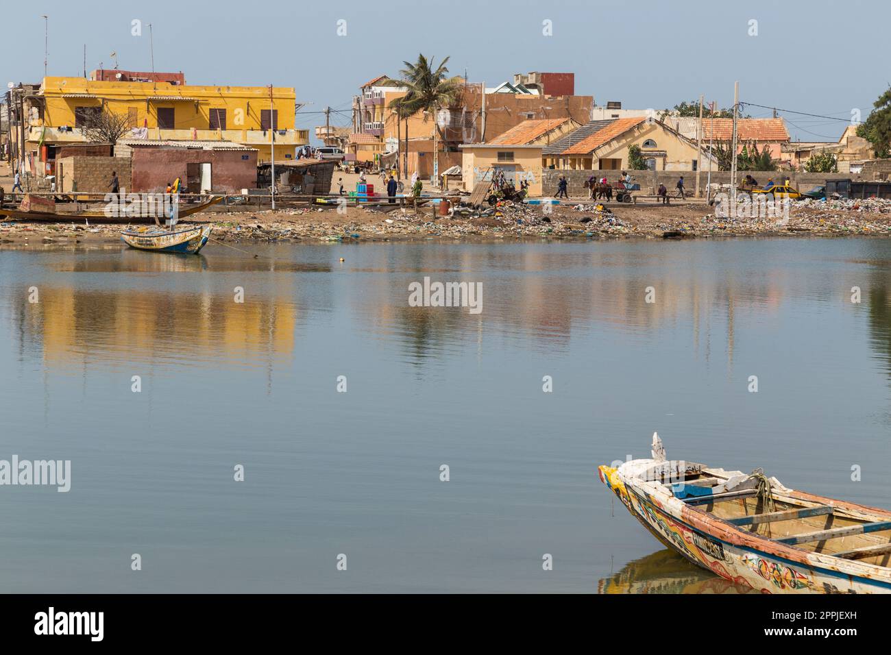 Fishing boats resting on the riverbank of the river senegal Stock Photo