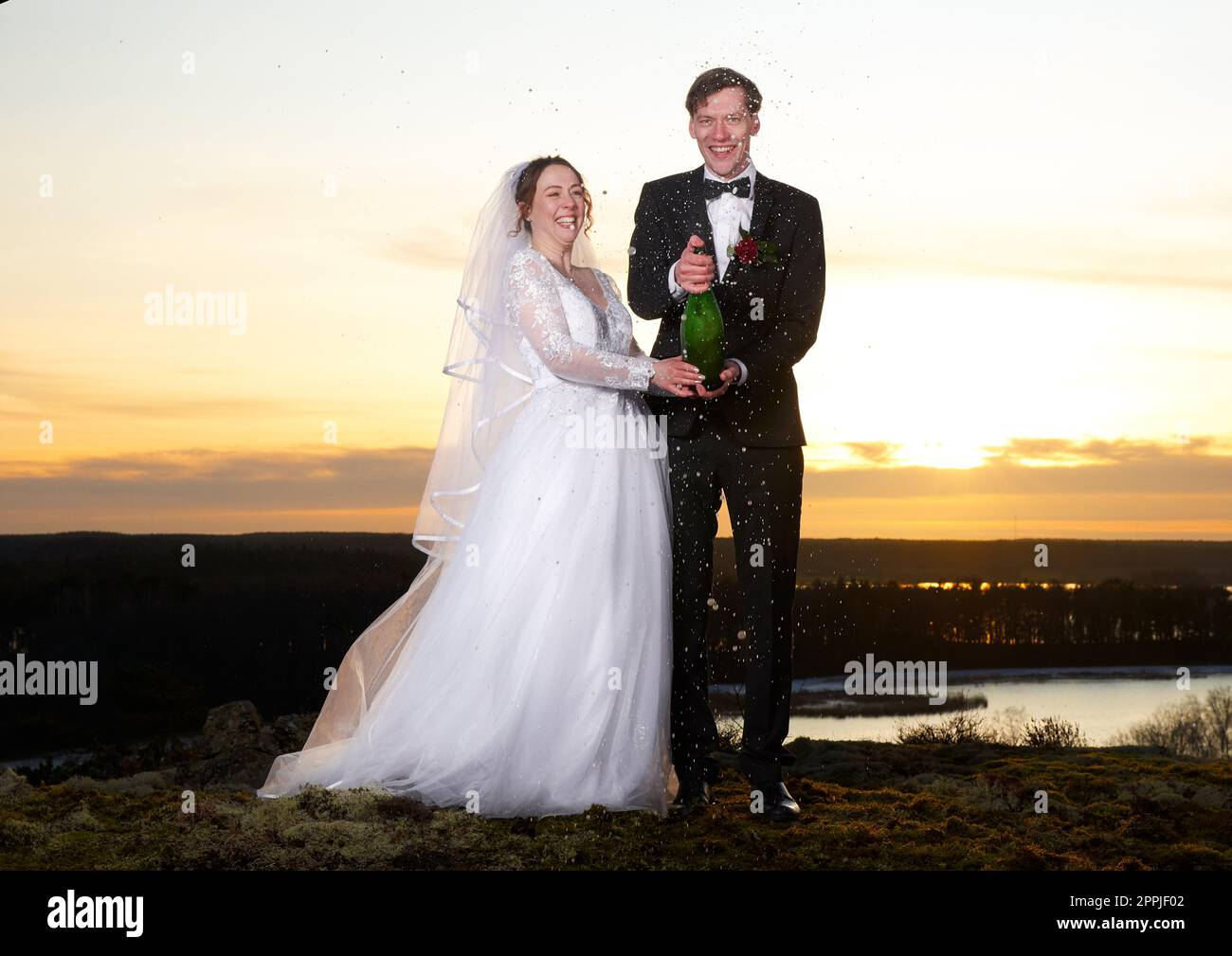 Young and happy newly weds Stock Photo Alamy