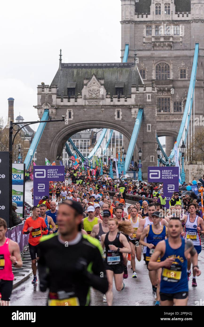 Runners competing in the TCS London Marathon 2023 passing through Tower