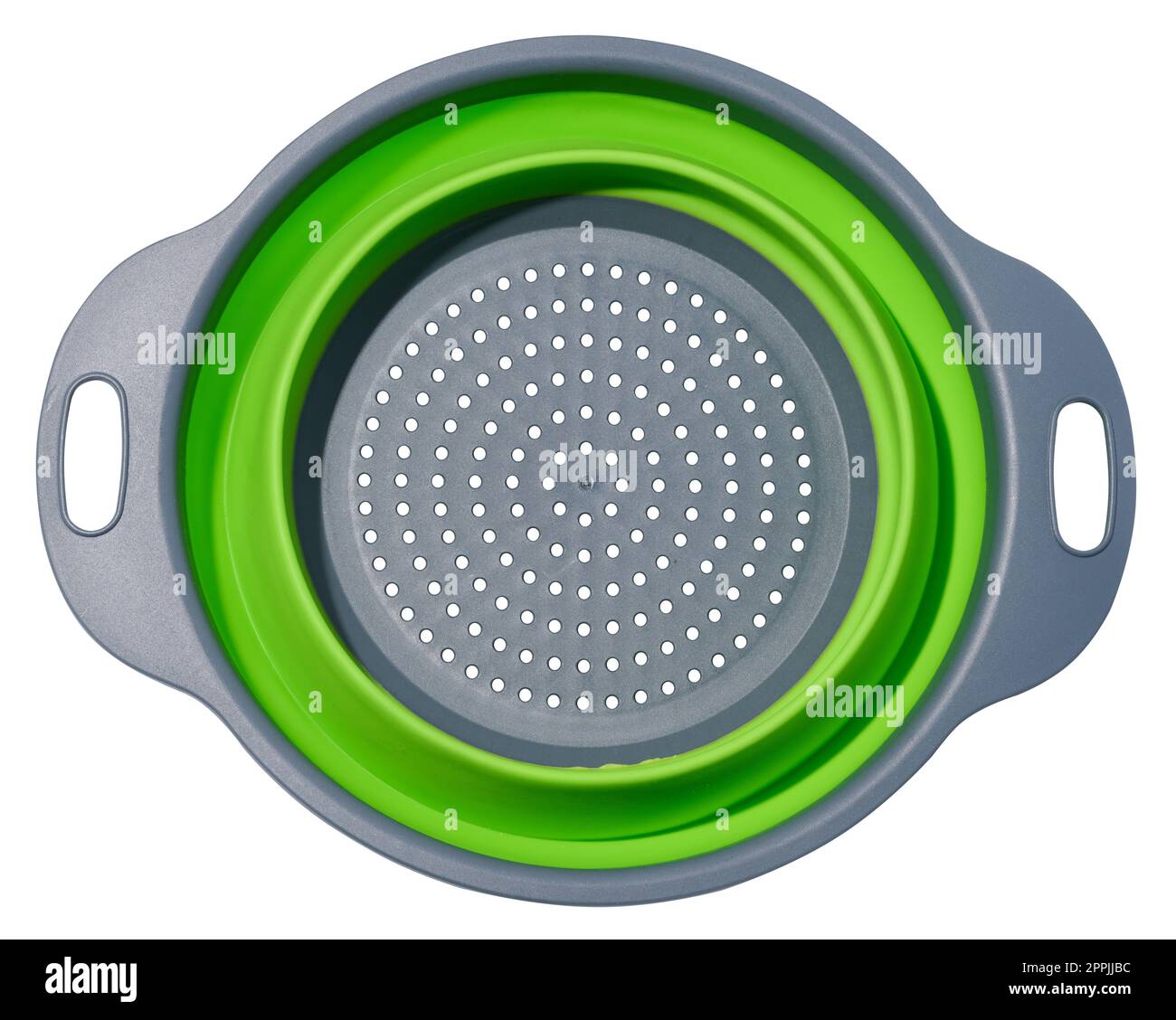 Plastic green collapsible colander on white isolated background, top view Stock Photo