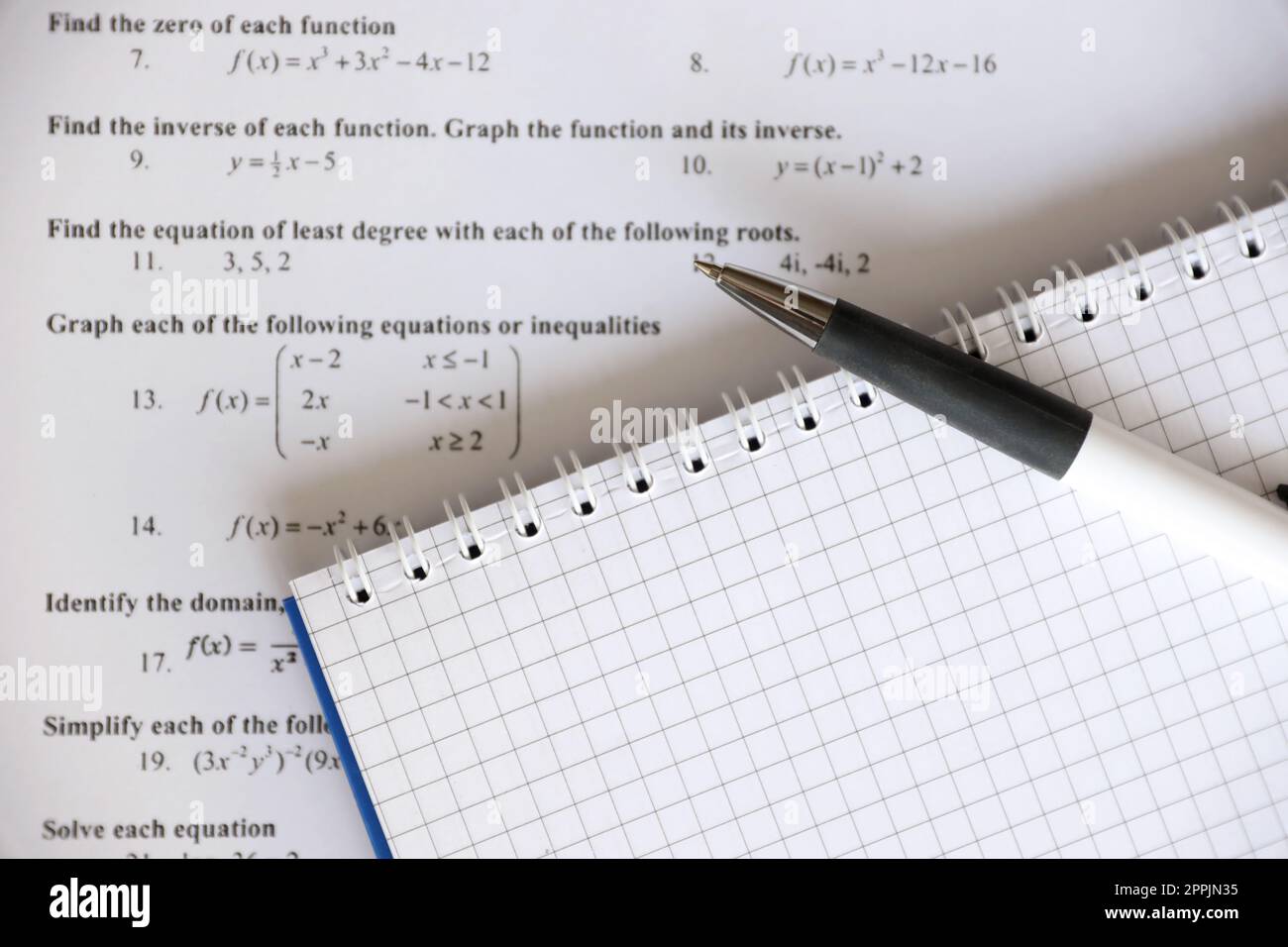 Handwriting of mathematics quadratic equation on examination, practice ...