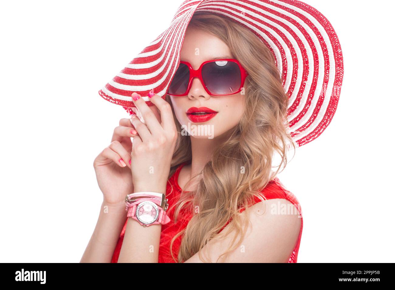 Bright cheerful girl in summer hat, colorful make-up, curls and pink manicure. Beauty face. Stock Photo