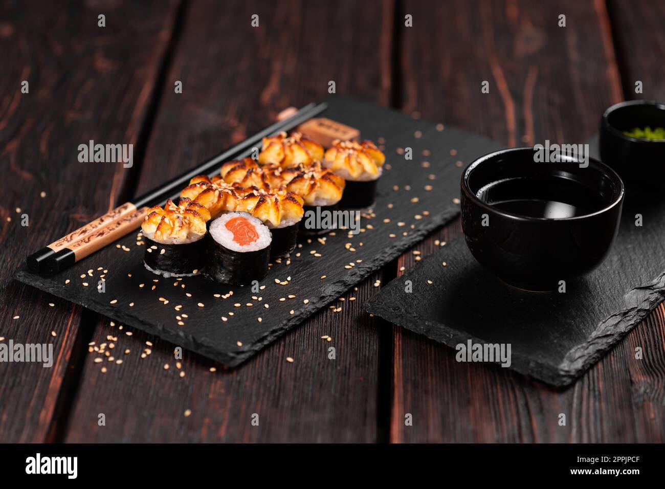 Japanese hot maki roll sushi with salmon - asian food concept Stock Photo