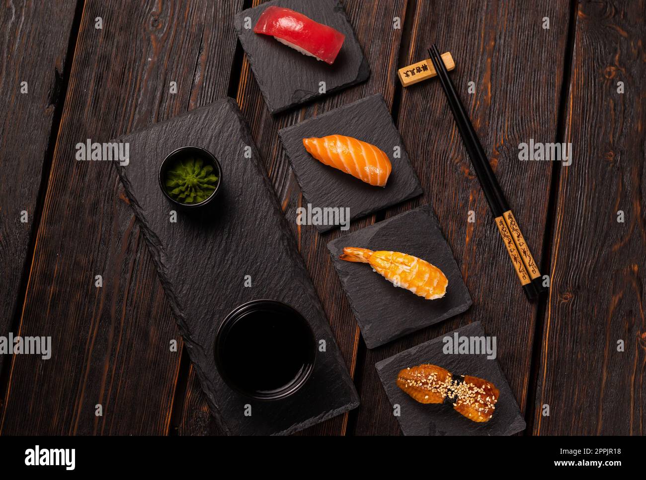 Delicious Sushi Nigiri on wooden background. Traditional Japanese cuisine Stock Photo