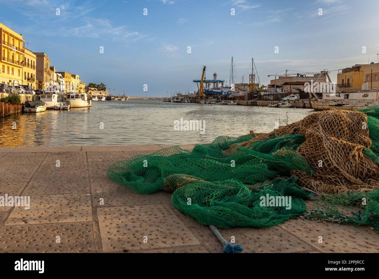 fishing nets on the pier Stock Photo - Alamy