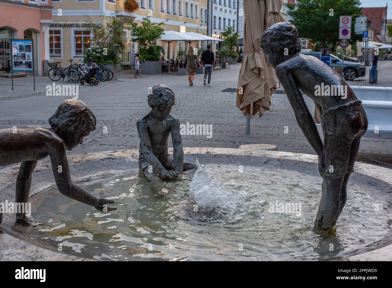 A fountain in the center of Landshut, with sculptures of playing children Stock Photo