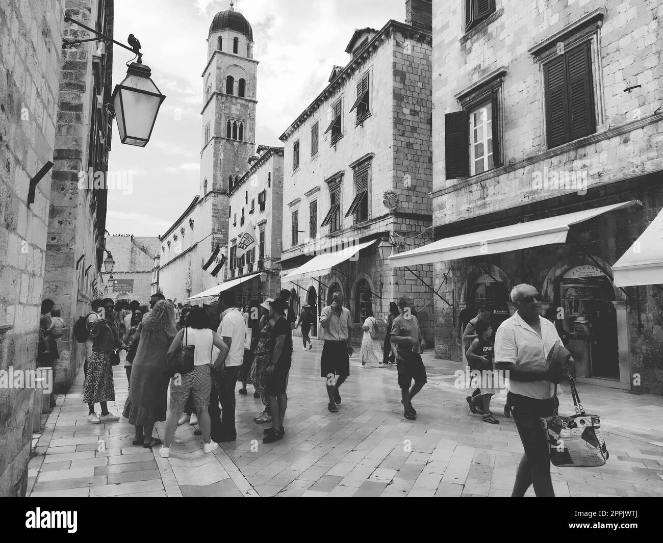 Stradun, Stradone is the main street of the historic city center of Dubrovnik in Croatia. architectural sights. A popular place for tourist walks. People are walking August 14, 2022 Black and white Stock Photo