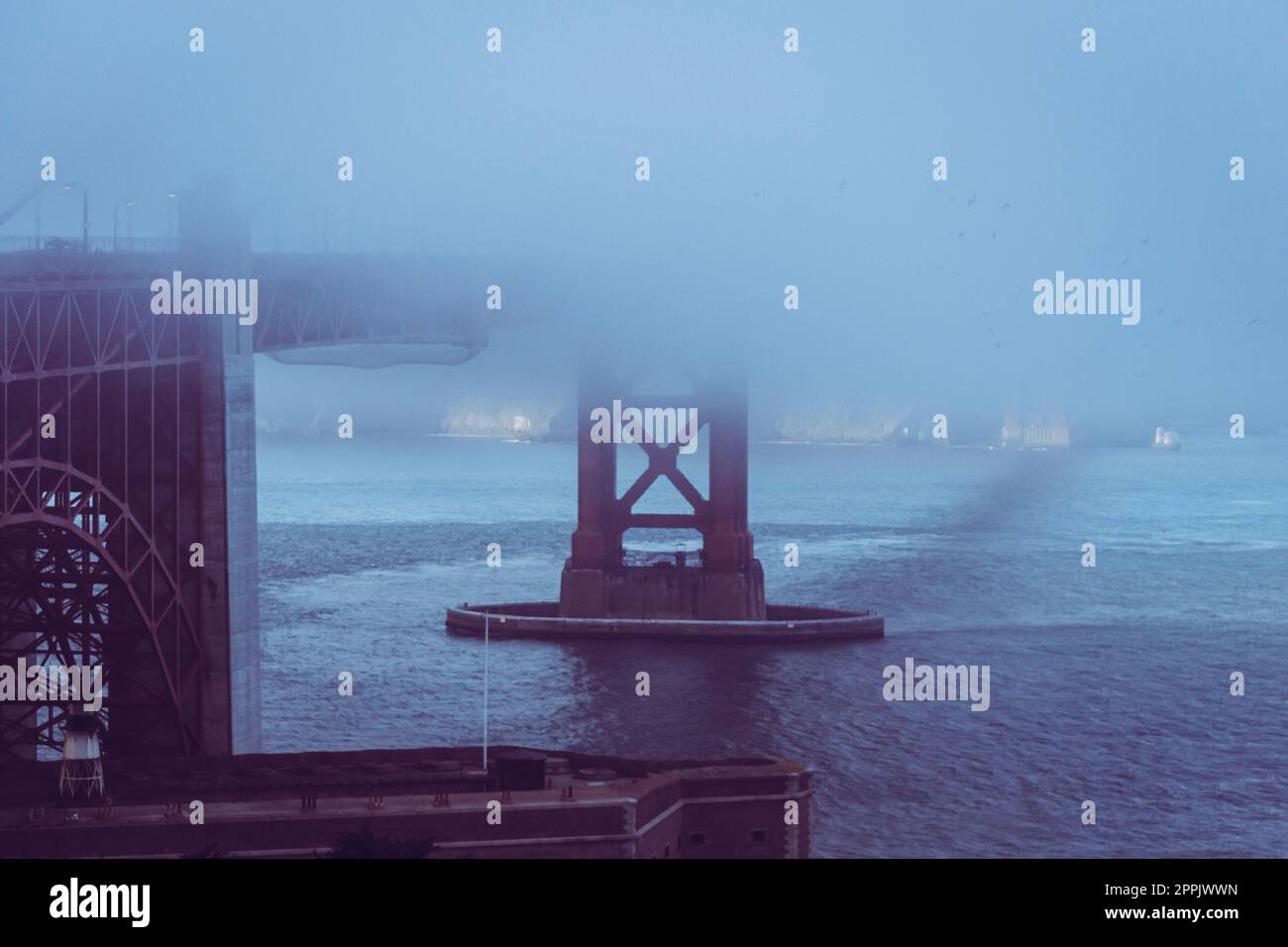 San Francisco Golden Gate bridge in winter fog Stock Photo