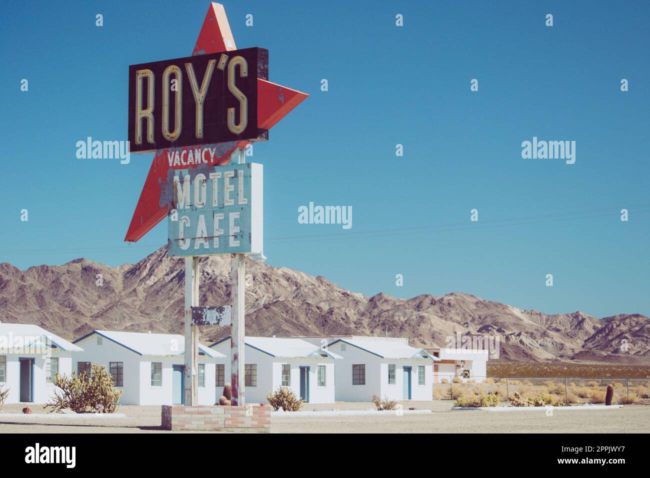 Famous Roy's cafÃ© and gas station alongside classic Route 66 Stock