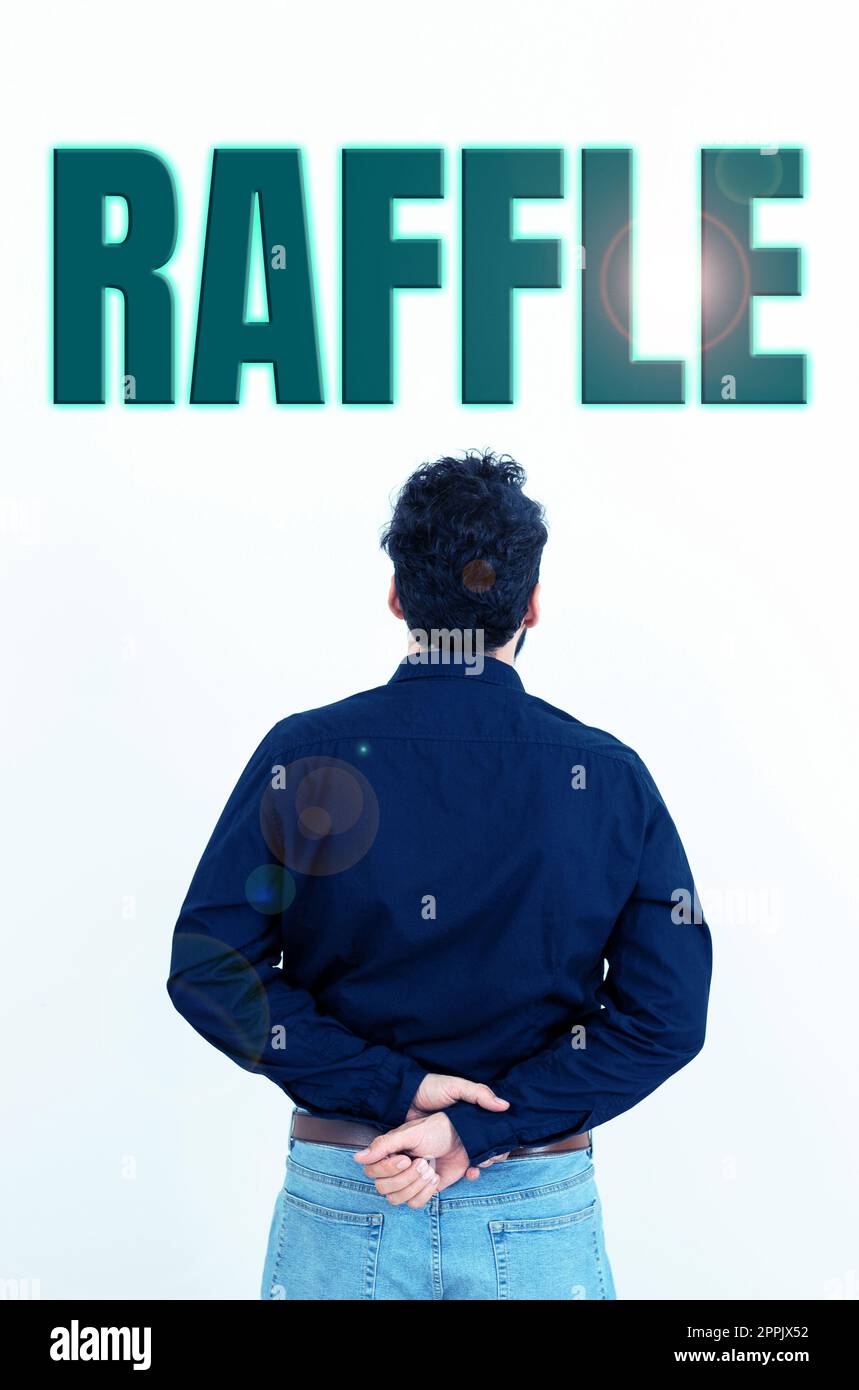 Hand writing sign Raffle. Internet Concept means of raising money by selling numbered tickets offer as prize Stock Photo