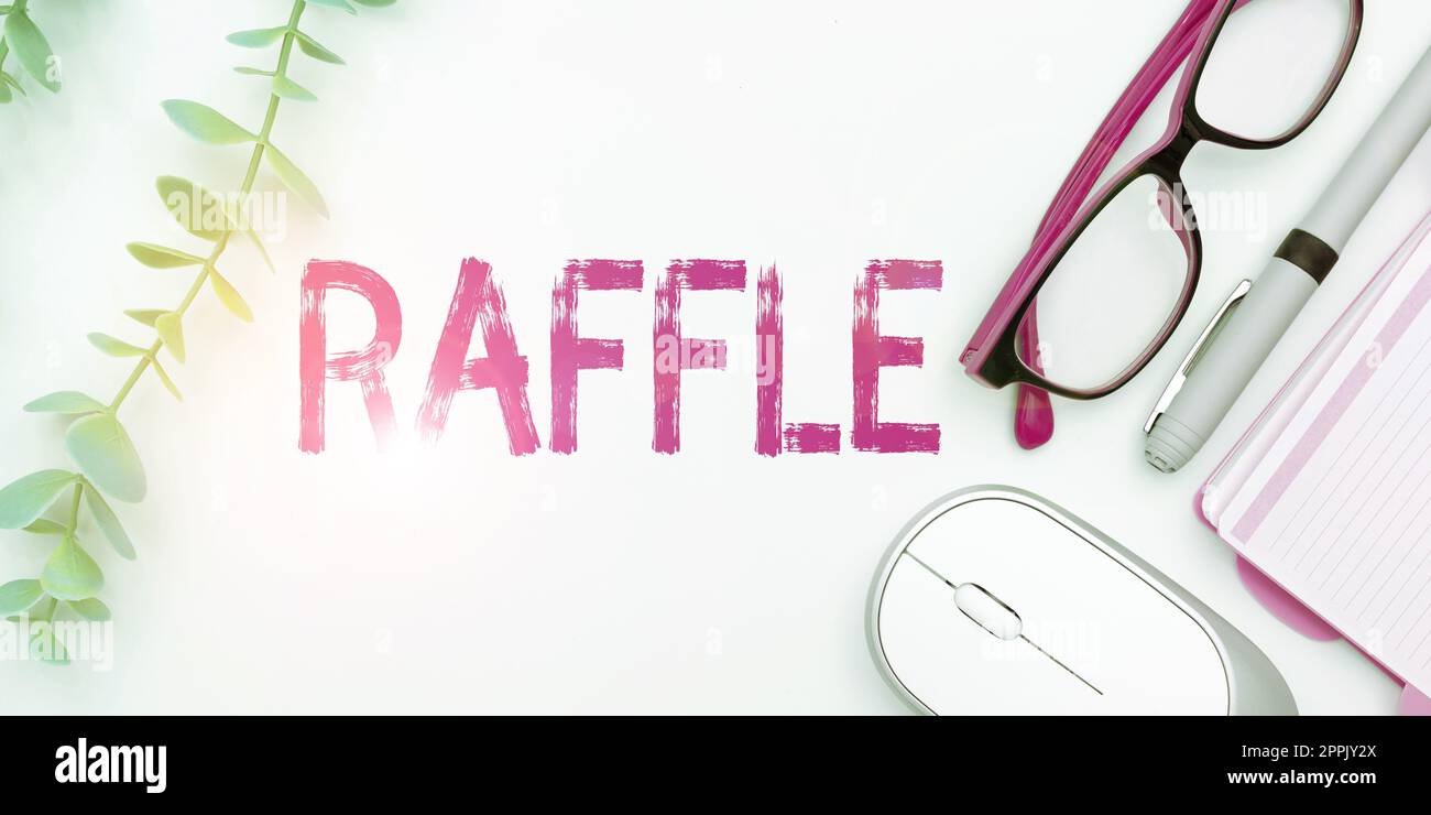 Hand writing sign Raffle. Business idea means of raising money by selling numbered tickets offer as prize Stock Photo
