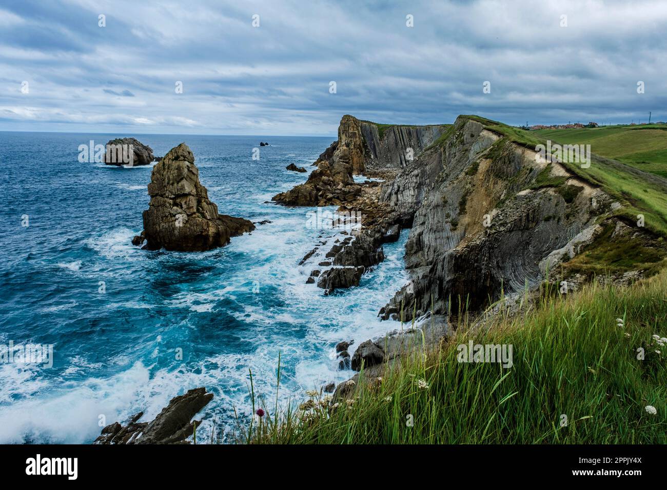 Rocky coastline in Liencres, Costa Quebrada, Spain Stock Photo