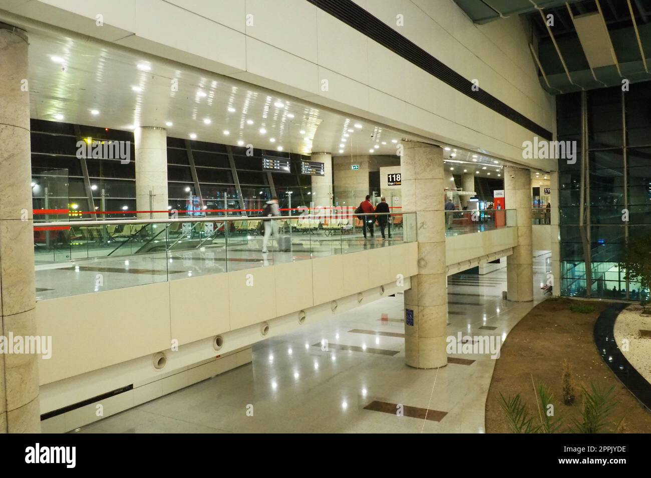 Ankara, Turkiye, Esenboga Havalimani Airport, 01.18.2023 lobby or corridor at the airport for the transit of passengers who have passed check-in. Airport interior. Shops, cafes and trees. Turkey Stock Photo