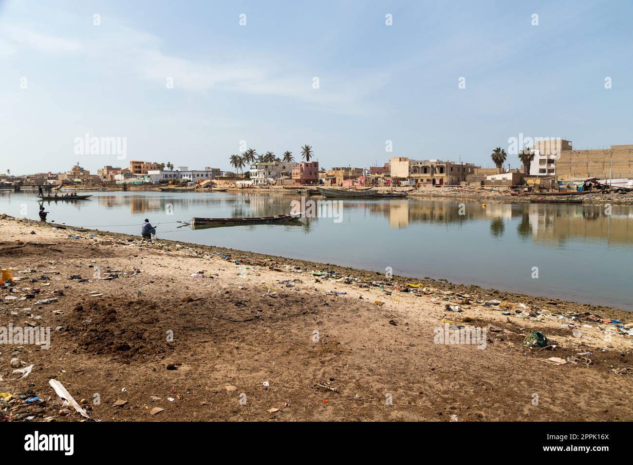 Fishing boats resting on the riverbank of the river senegal Stock Photo