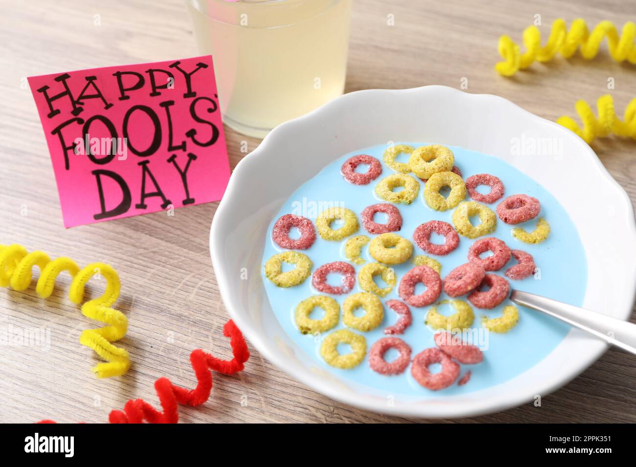 Plate of corn rings with light blue milk, drink and words Happy Fool's ...
