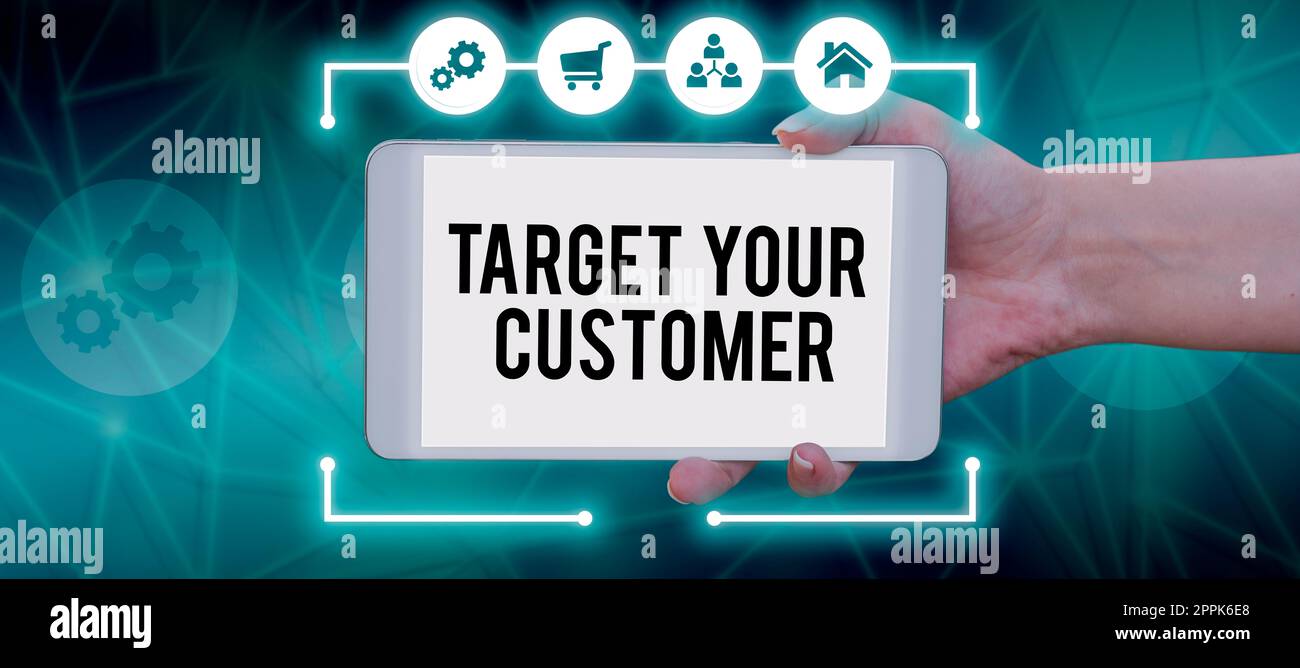 Hand writing sign Target Your Customer. Word Written on attract and grow audience, consumers, and prospects Stock Photo