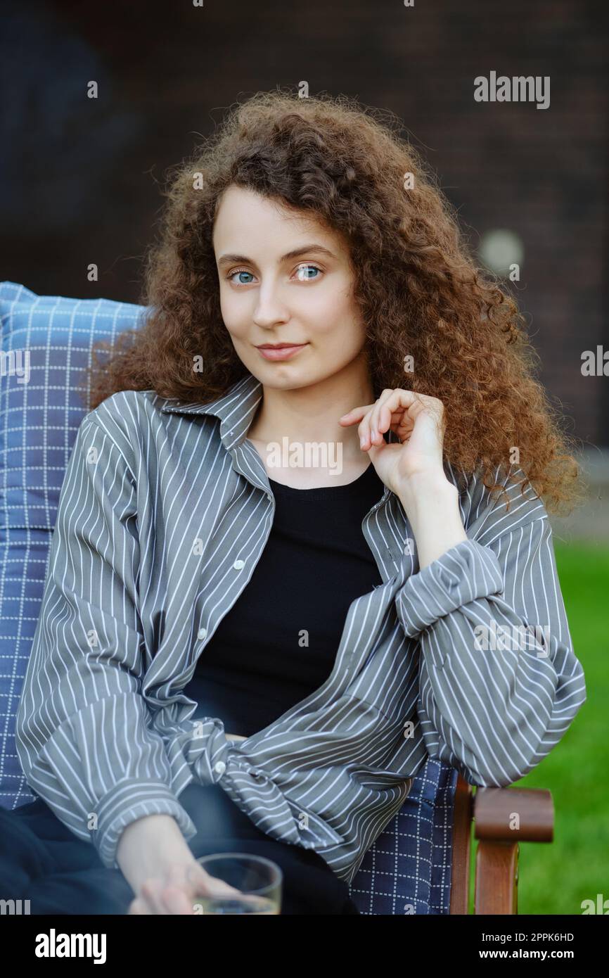 Brunette long curly hair hi-res stock photography and images - Alamy