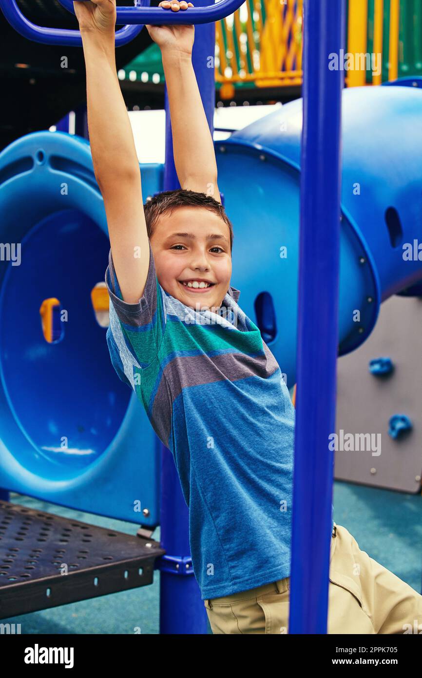 My arms are getting a killer workout. a young boy playing on the