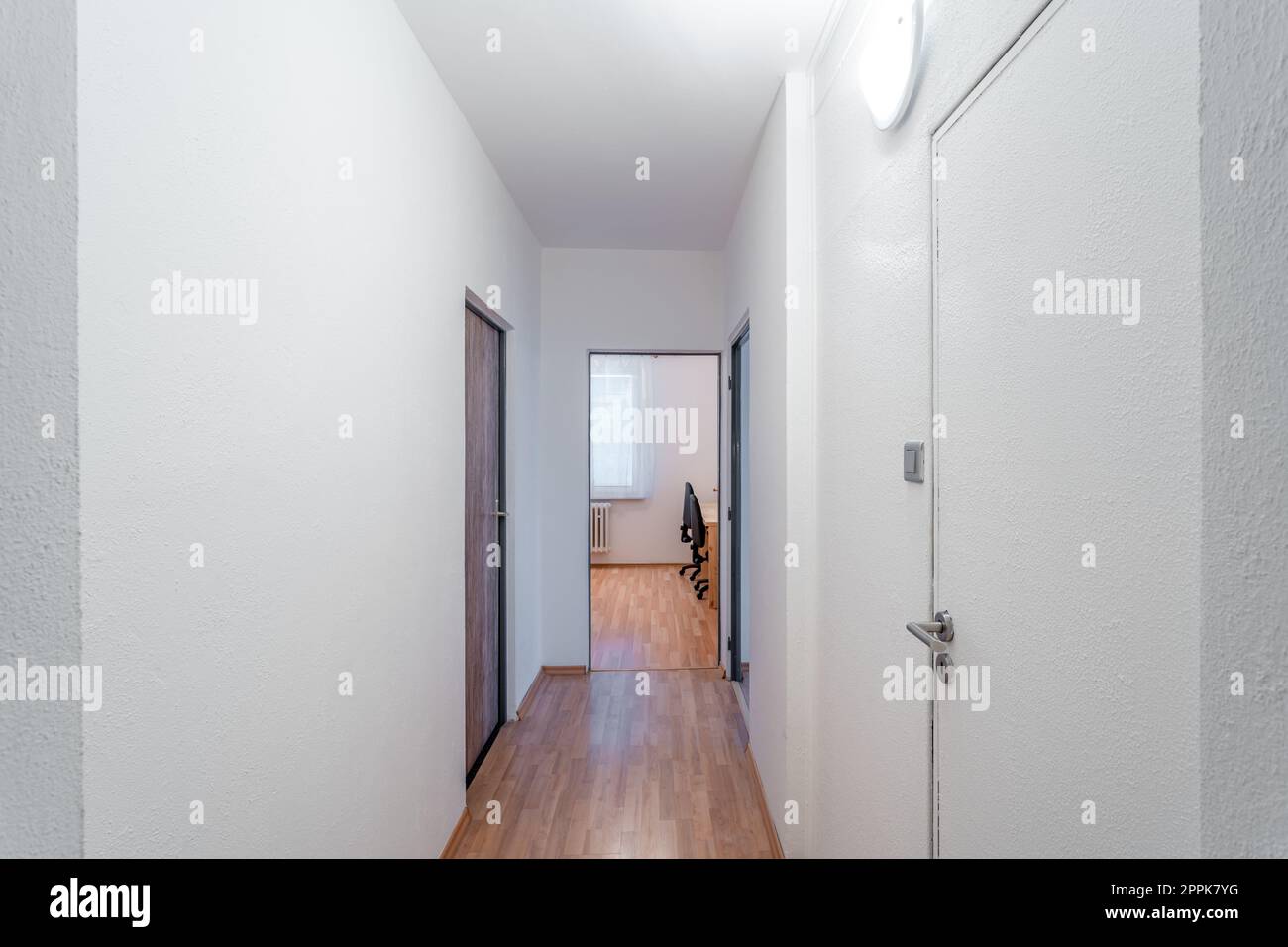 long corridor in a panel apartment Stock Photo