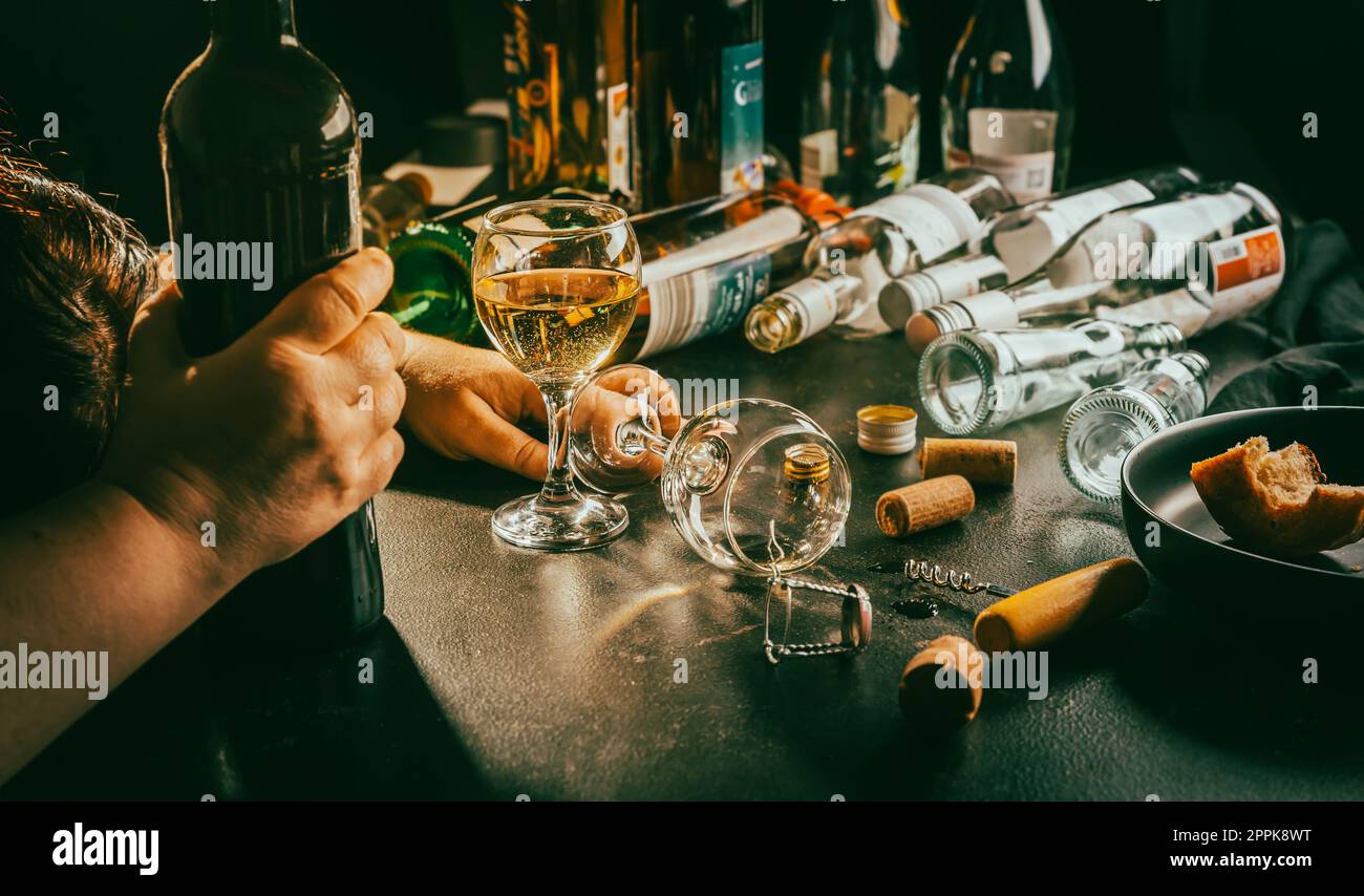 After party - empty bottles, concept of alcoholism, alcohol abuse and addiction Stock Photo