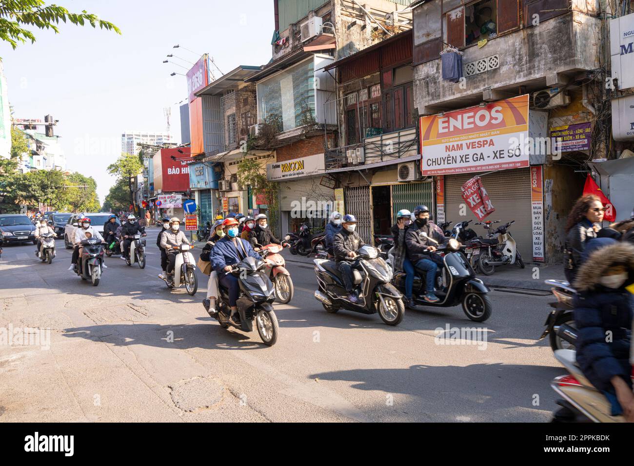 the chaotic traffic of mopeds in Hanoi, Vietnam. Stock Photo
