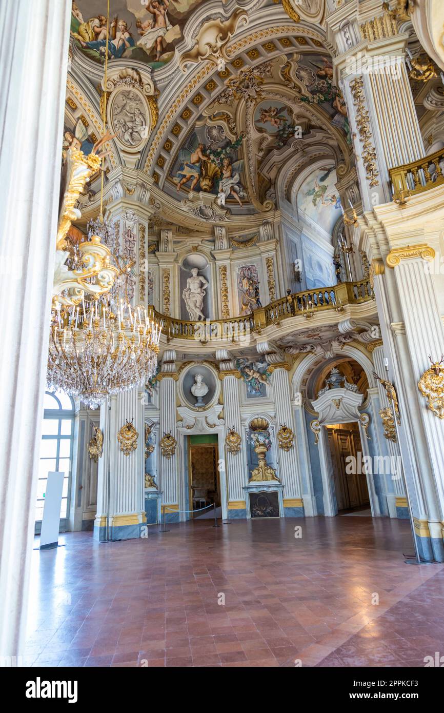 Italy, Stupinigi - January 2023: luxury interior of Royal Palace with baroque design and window Stock Photo