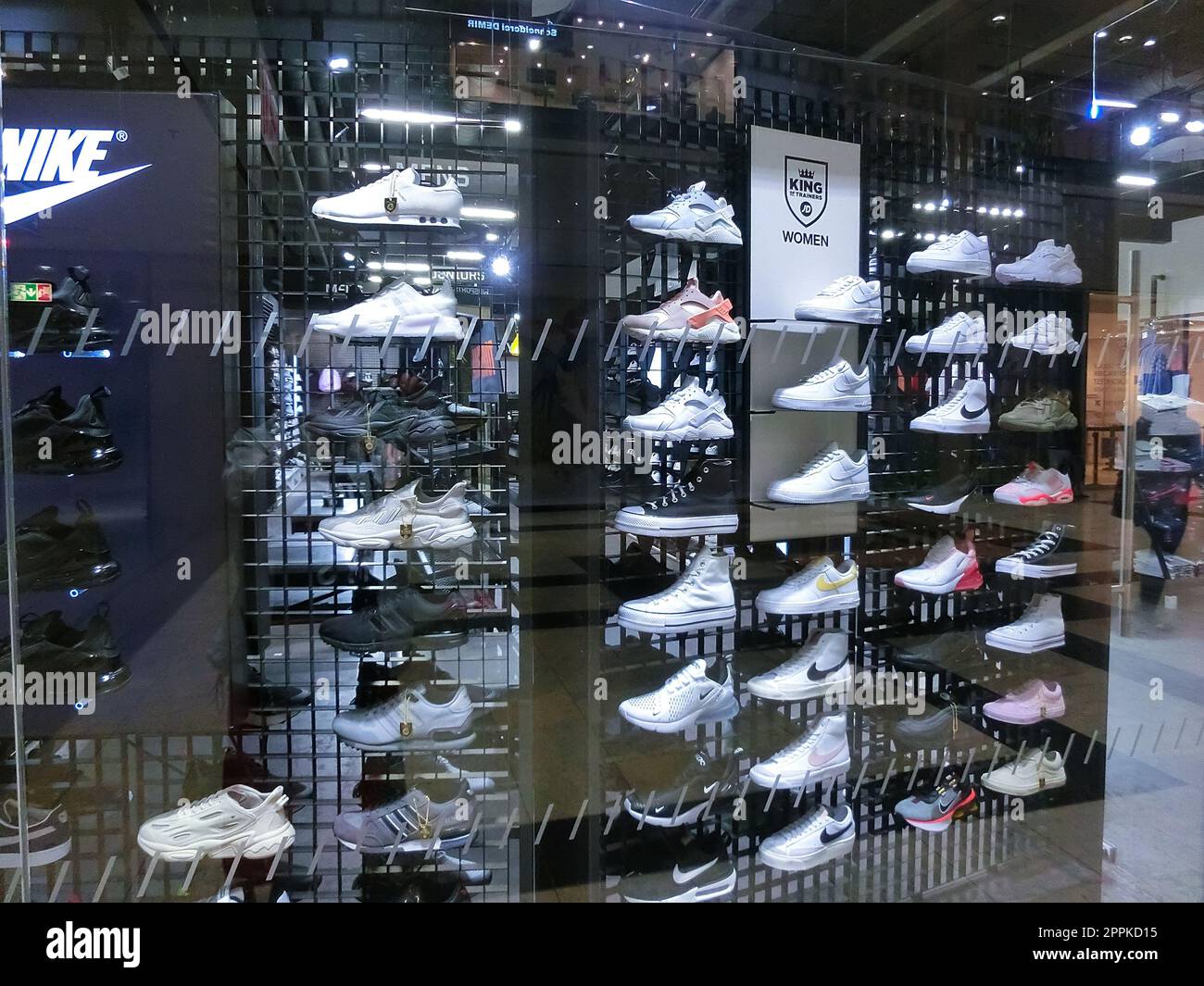 Wall of sneakers inside the sports shop of shoes in the Isenburg-Zentrum, Neu-Isenburg, Germany Stock Photo
