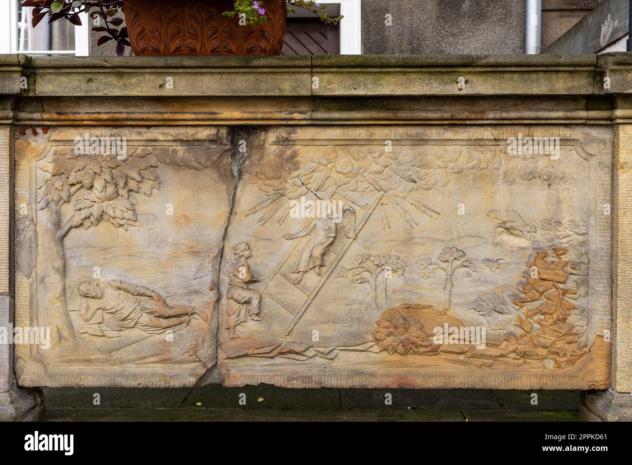 Stone relief decorating the entrances to houses at Mariacka Street in GdaÅ„sk. Stock Photo