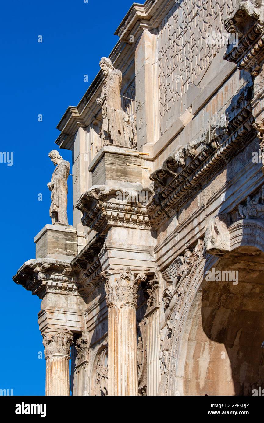 4th century Arch of Constantine, (Arco di Costantino) next to Colosseum, details of the attic, Rome, Italy Stock Photo