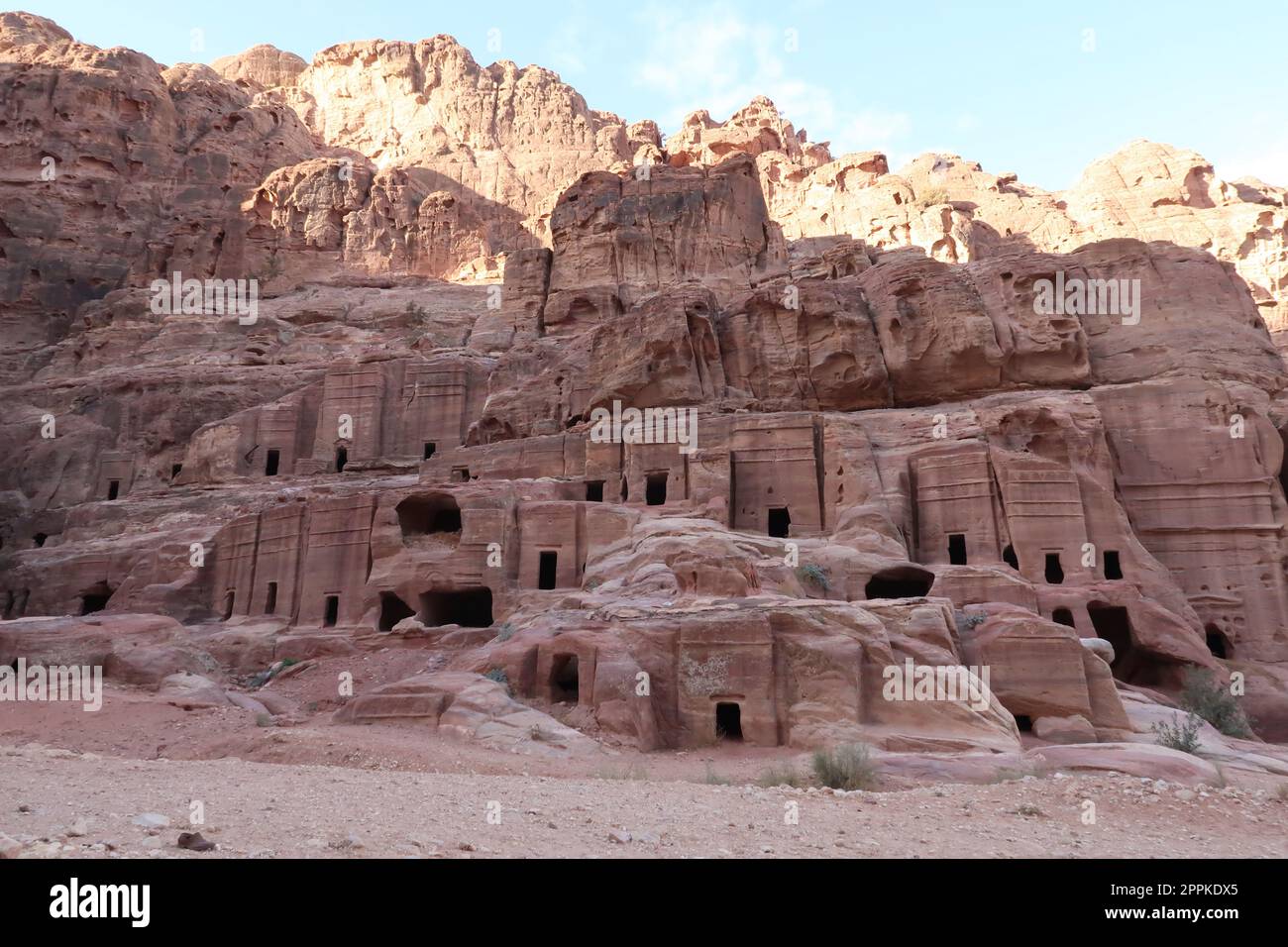 Walking along the street of facades in the ancien nabataean city of Petra Stock Photo