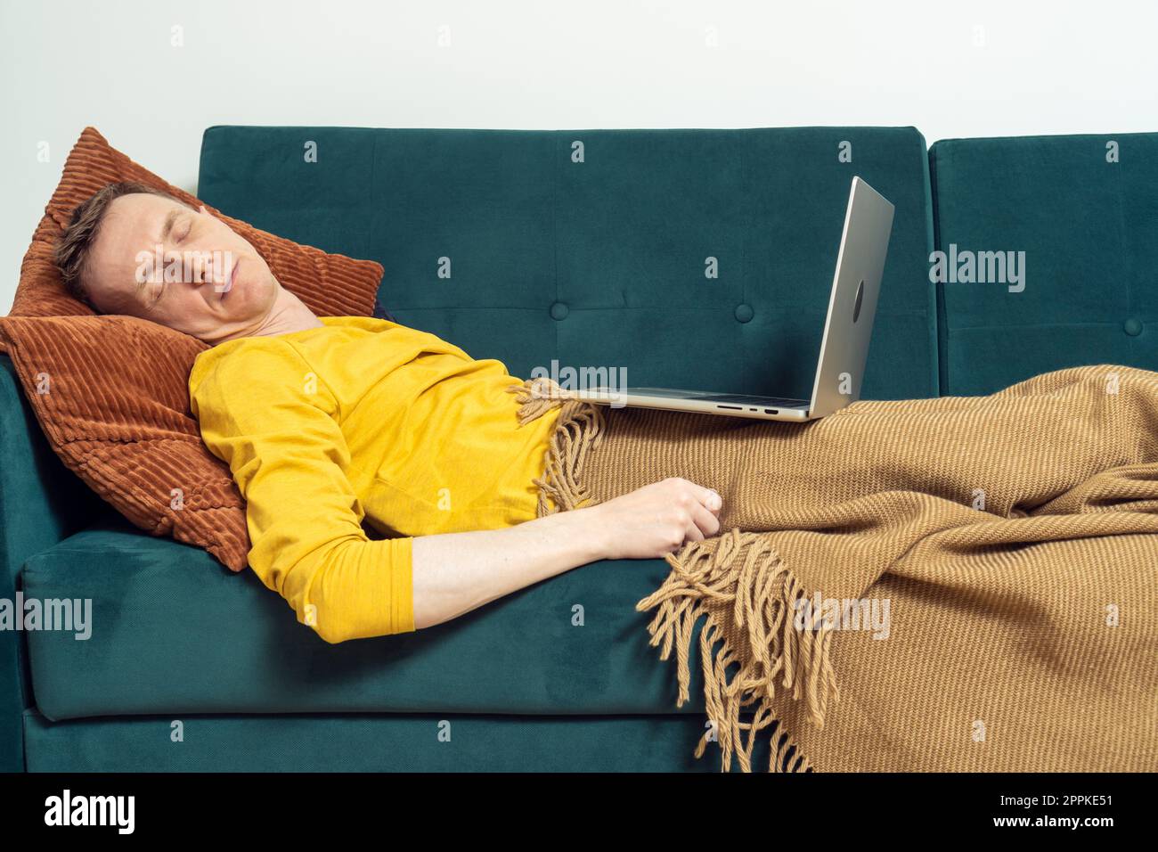 Man reclining in living room hi res stock photography and images