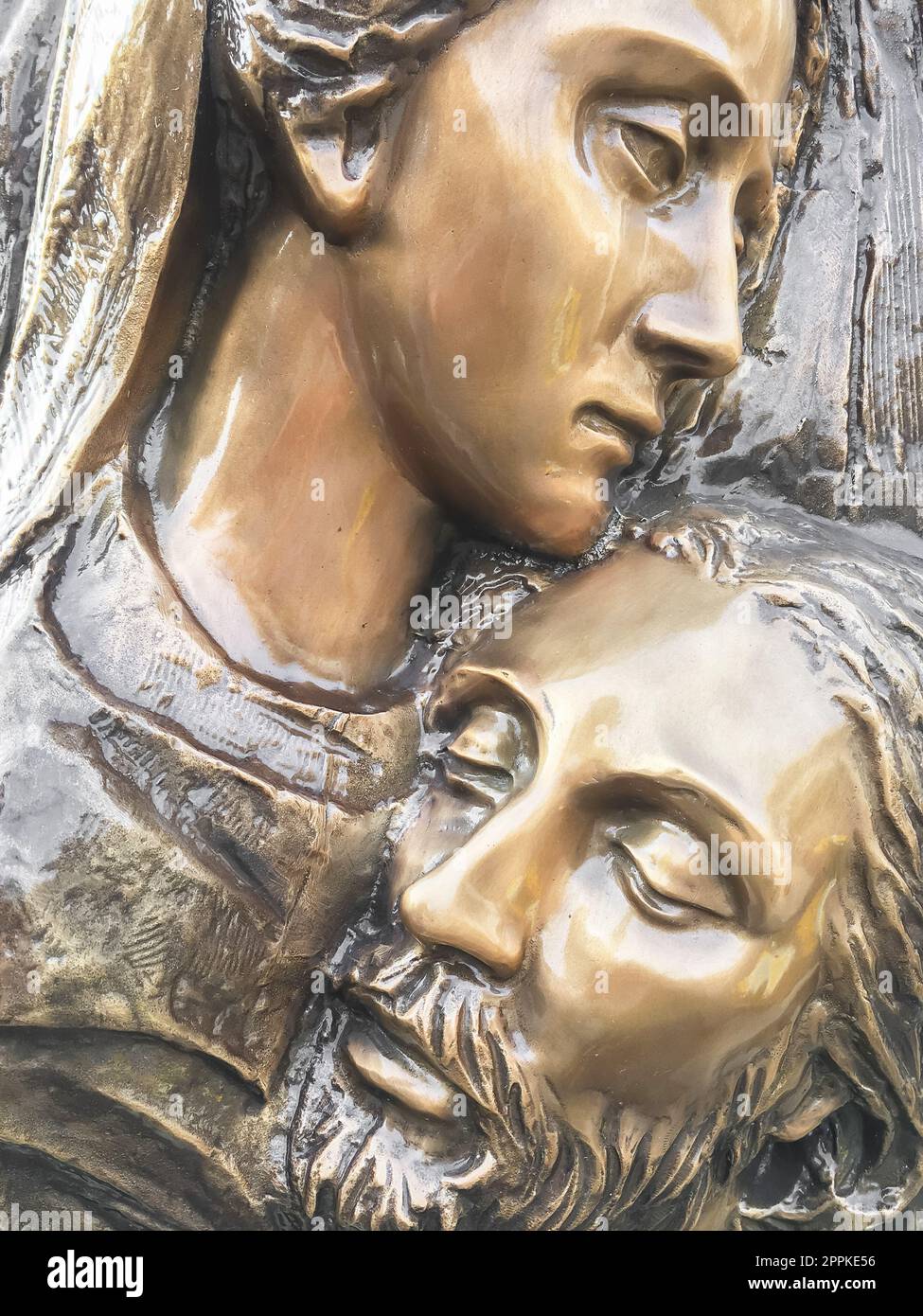 Jesus and Mary. Bronze statue of Mother Mary holding her son Jesus ...
