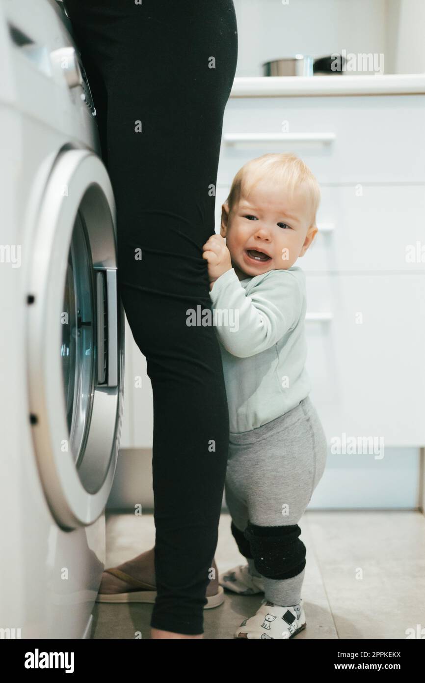 Young child doing house chores at home. Asian baby boy sweeping floor with  broom Stock Photo - Alamy