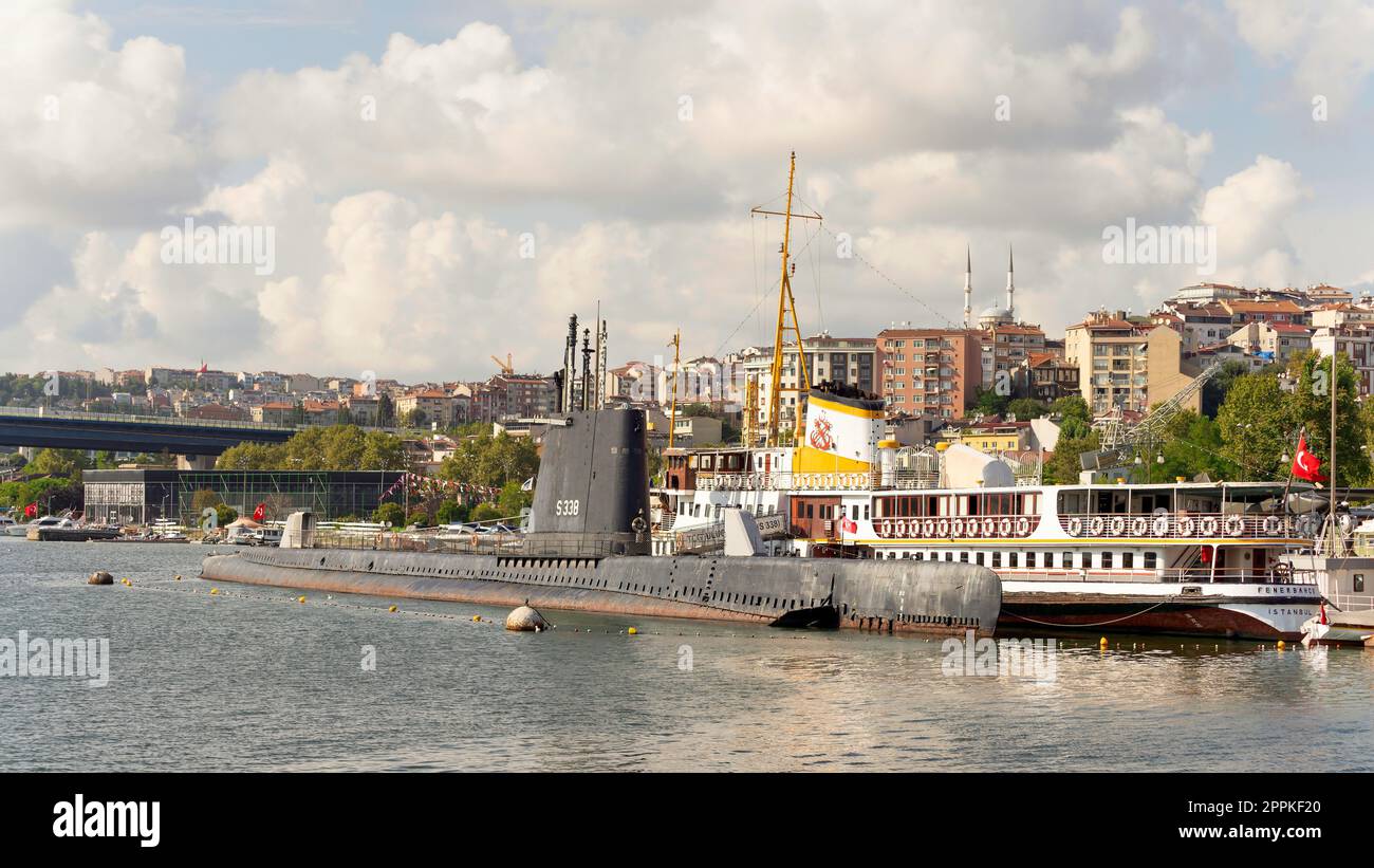 Golden Horn, with S 338 submarine, Fenerbahce ferry boat, and Golden Horn Bridge, Beyoglu district, Istanbul, Turkey Stock Photo