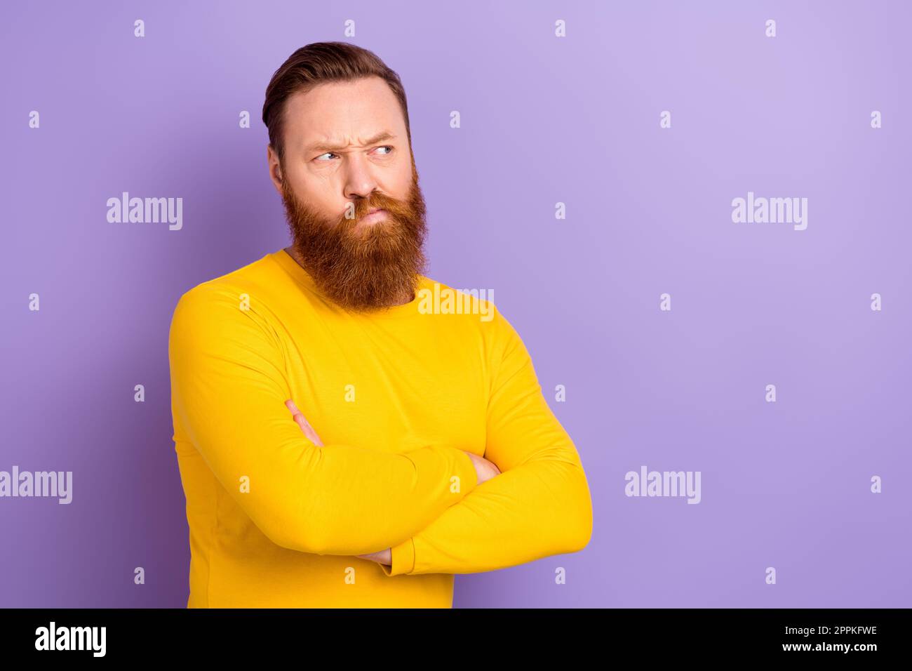 Photo of young businessman wear yellow jumper crossed arms looking ...