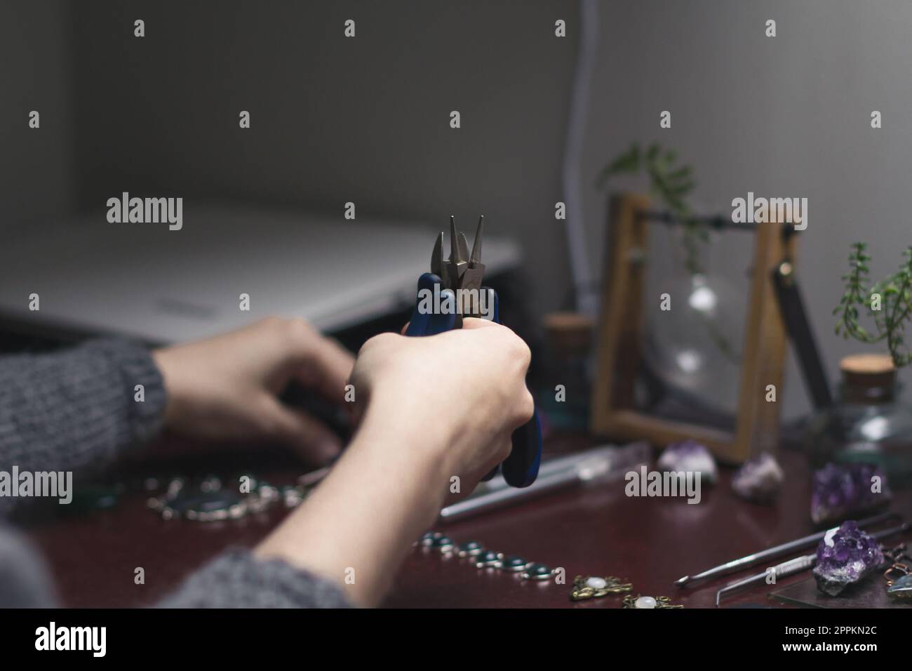 Close up jewelry bending tools concept photo. Hand pliers. Side view