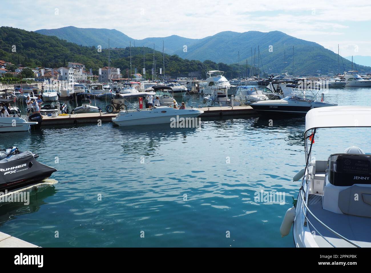 Meljine, Herceg Novi, Montenegro, August 13 2022 Boats, yachts and ships are at anchor. Moored ships in the parking lot. Adriatic Sea Mediterranean. Travel business. Sea travel and sports. Summer time Stock Photo