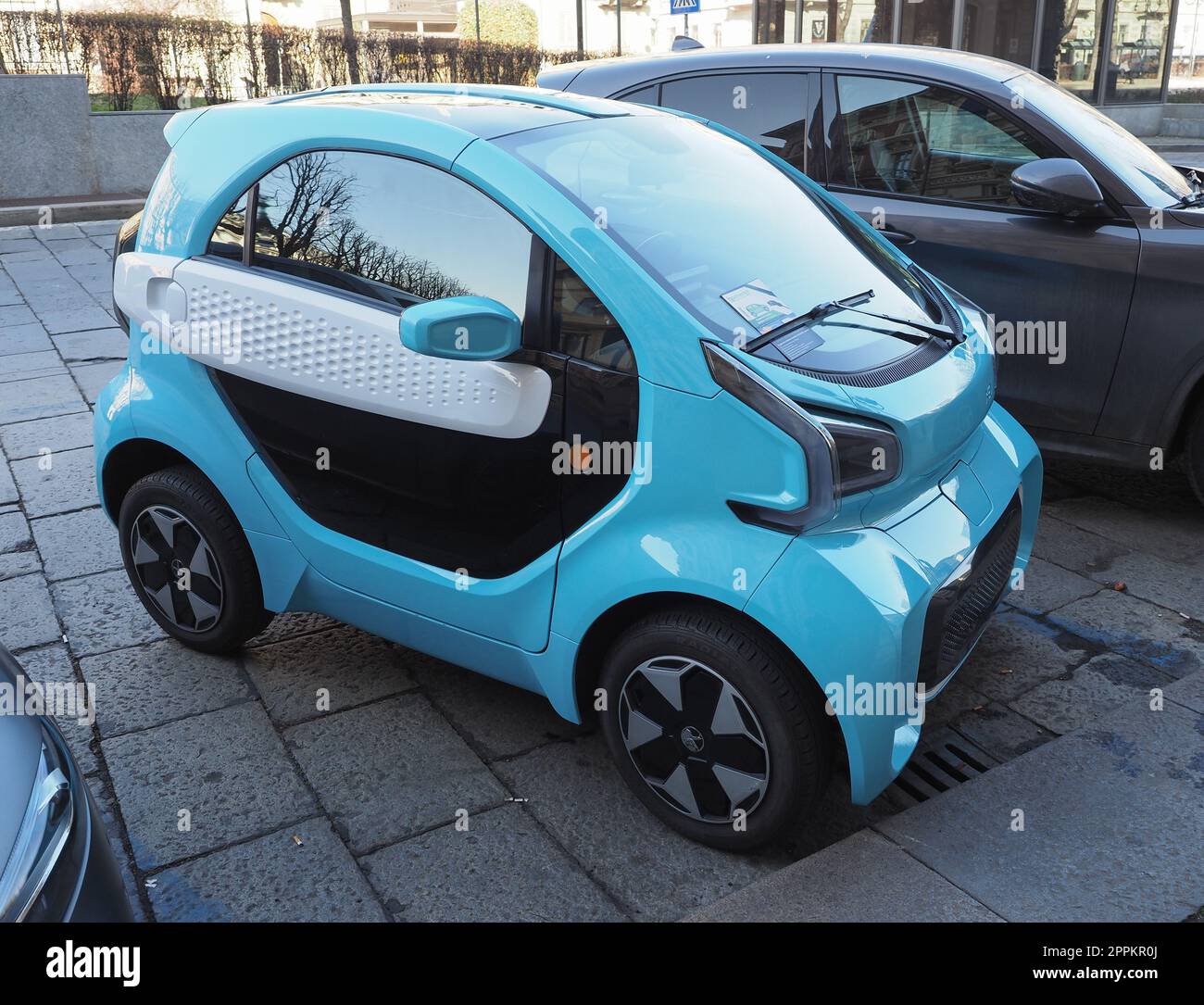 Light blue Xev Yoyo electric car in Turin Stock Photo Alamy