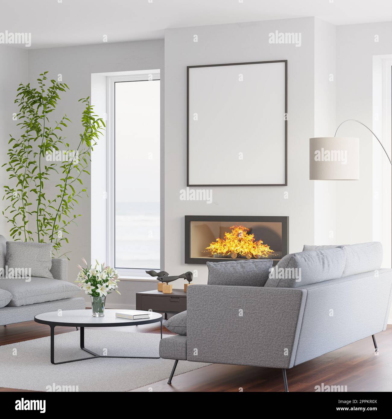 Model apartment at the sea. Sofas, Lilies in vase, fireplace with fire, mockup picture frame, windows to the sea. Stock Photo