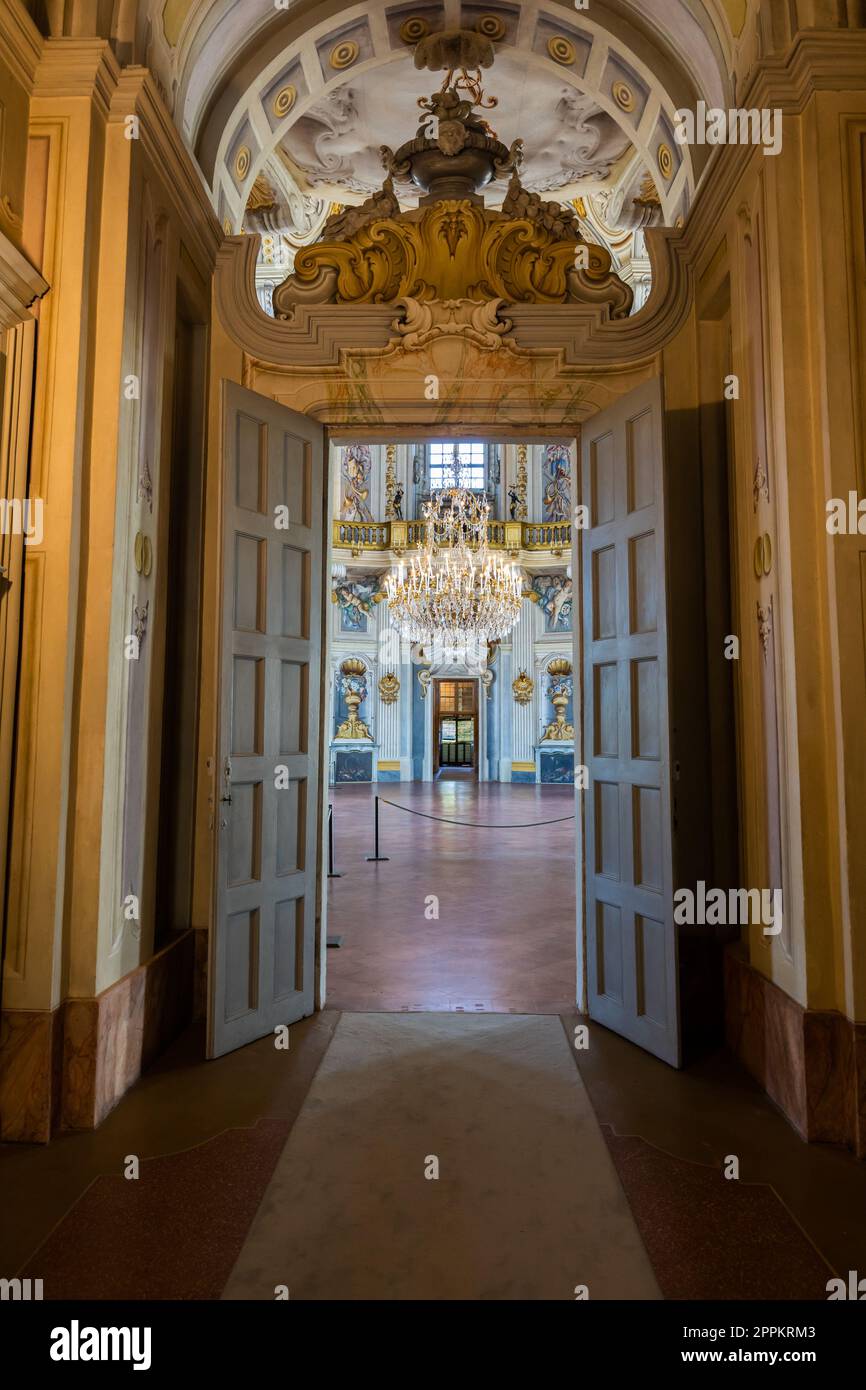 Italy, Stupinigi - January 2023: luxury interior of Royal Palace with baroque design and window Stock Photo