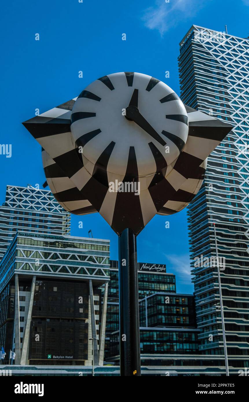 THE HAGUE, THE NETHERLANDS - AUGUST 26, 2013: The Monumental Clock, also known as the Zebra clock, is a street clock and work of public art next to Den Haag central railway station in The Hague, the Netherlands, installed in 1977 by artist Jaap Karman Stock Photo