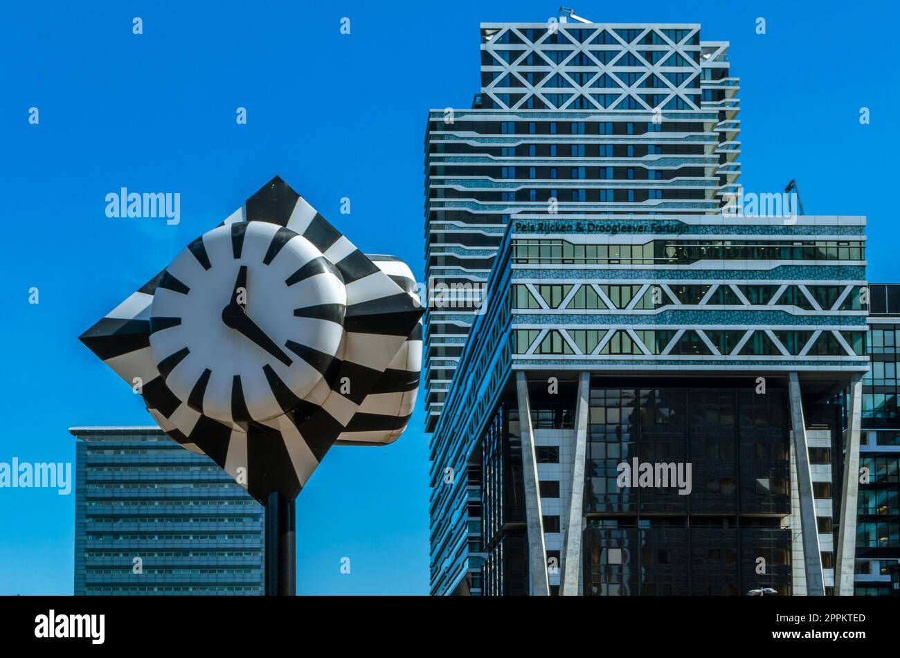 THE HAGUE, THE NETHERLANDS - AUGUST 26, 2013: The Monumental Clock, also known as the Zebra clock, is a street clock and work of public art next to Den Haag central railway station in The Hague, the Netherlands, installed in 1977 by artist Jaap Karman Stock Photo
