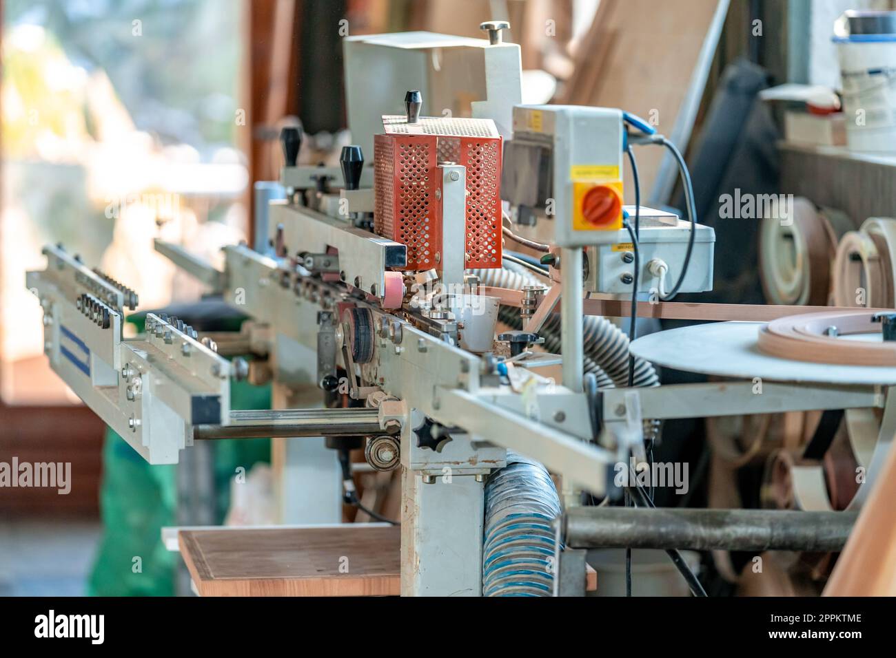 machine for adjusting the edge of a laminate board in carpentry Stock