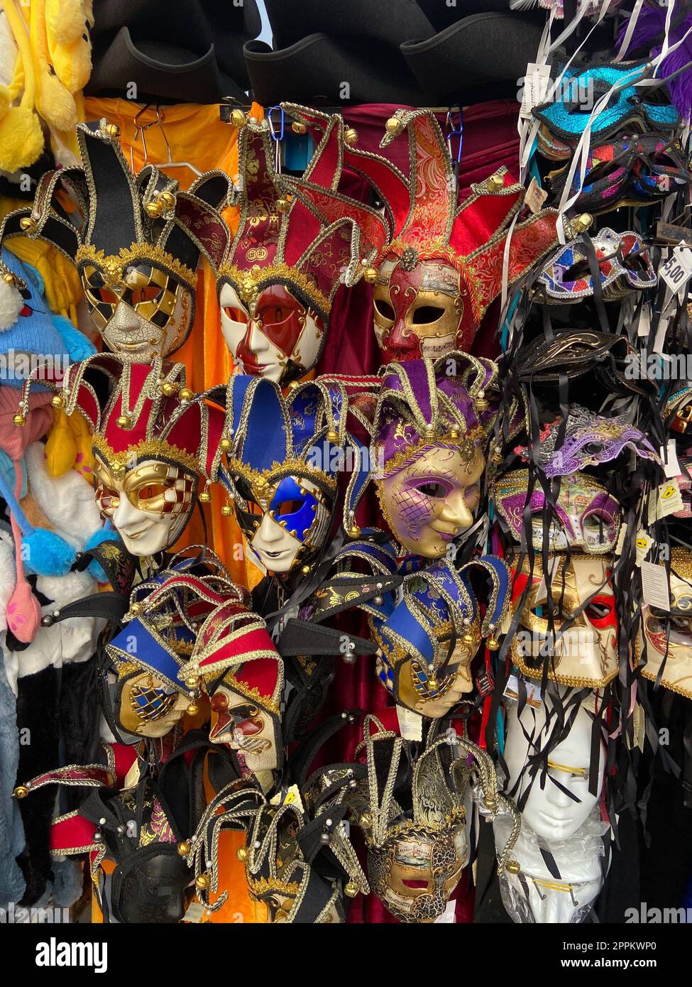 traditional Venetian carnival mask on street stand Stock Photo