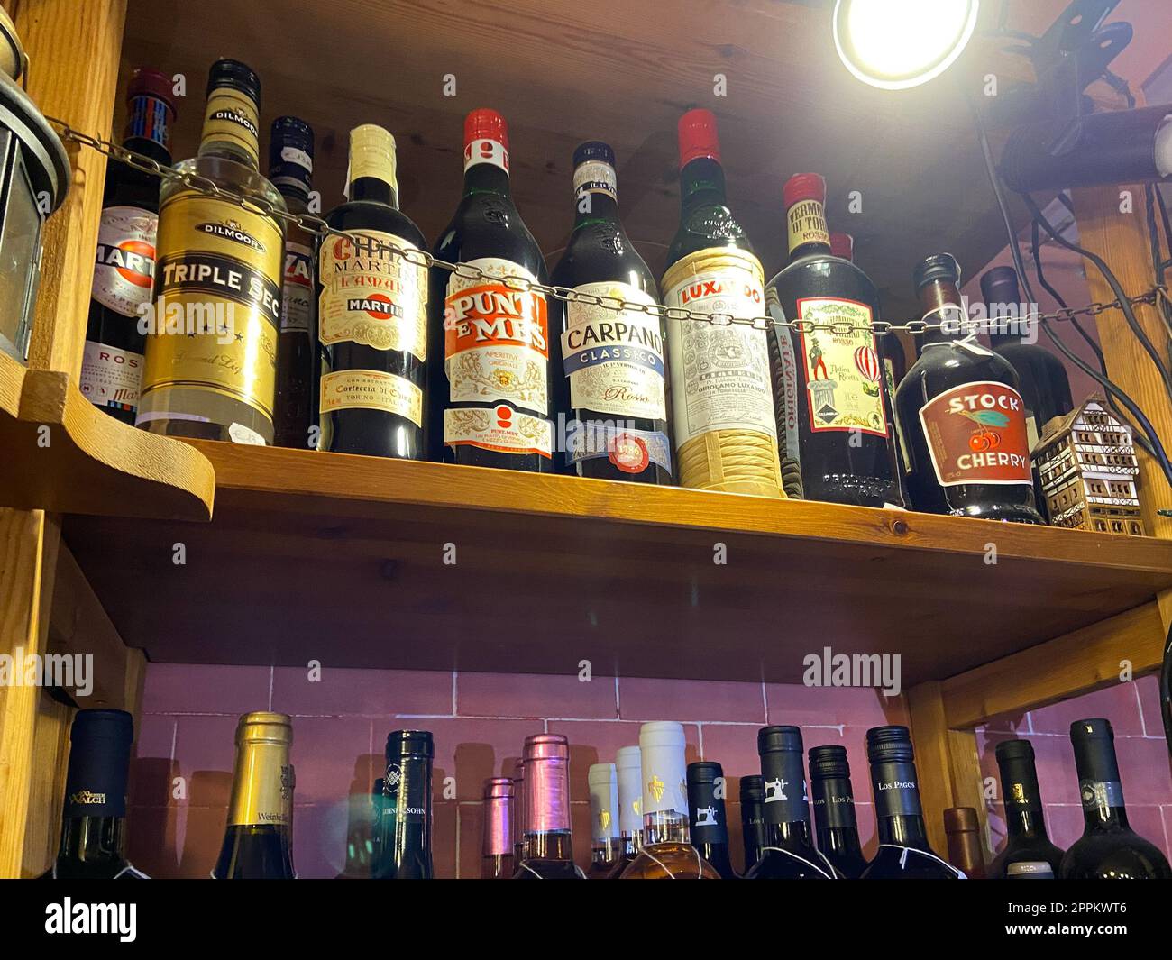 bottles with strong drinks in local wine shop Stock Photo Alamy