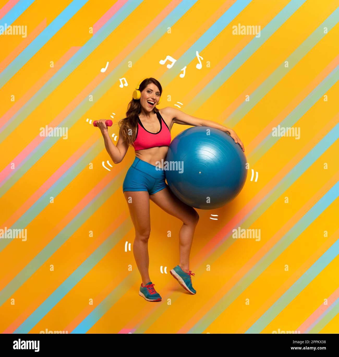 Girl trains with handlebars. yellow color banner Stock Photo Alamy