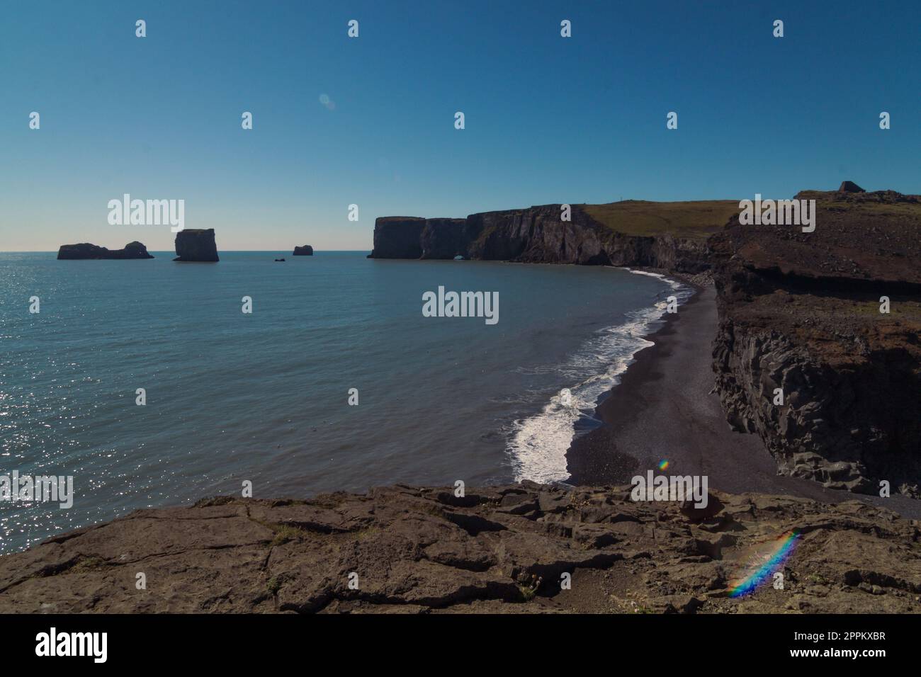 Dyrholaey beach on sunny day landscape photo Stock Photo