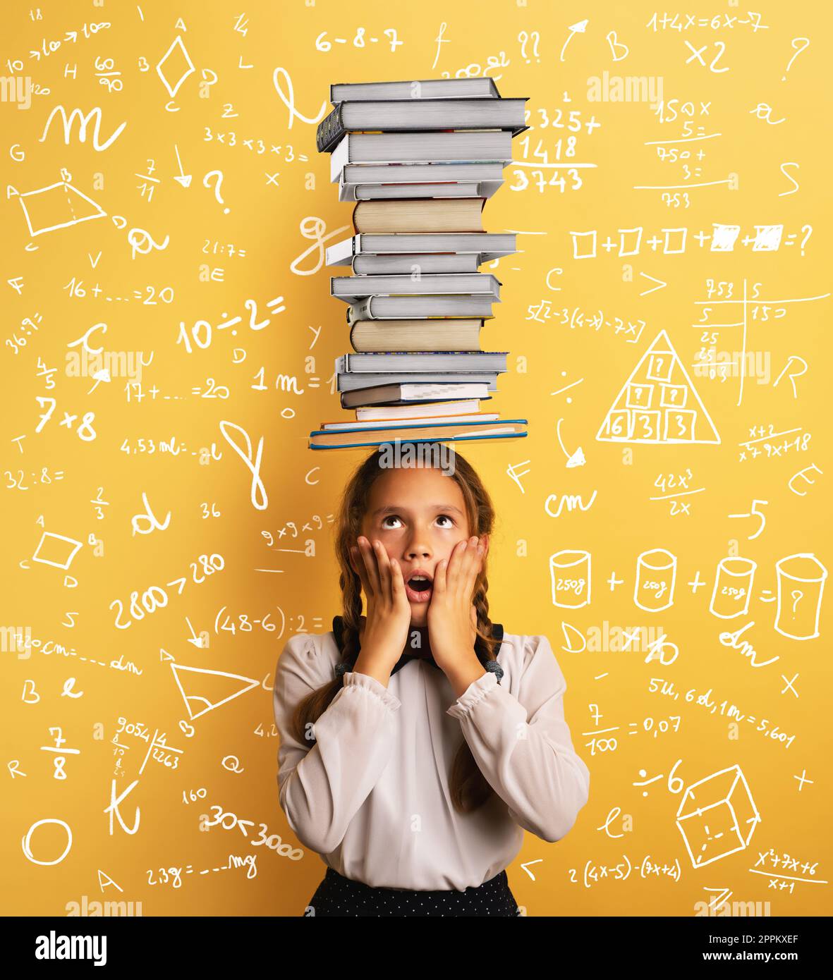 Young child student worried due to too much books to read and study. Yellow background with sketch of math and algebra problems Stock Photo