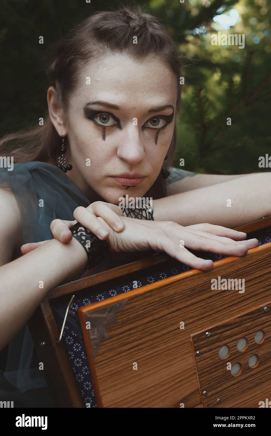 Close up female celtic warrior with mysterious box portrait picture Stock Photo